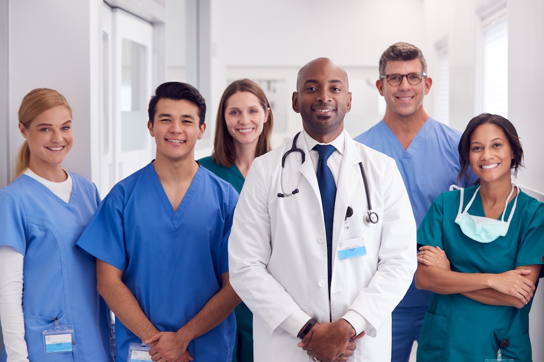 Group of medical professionals posing with smiles