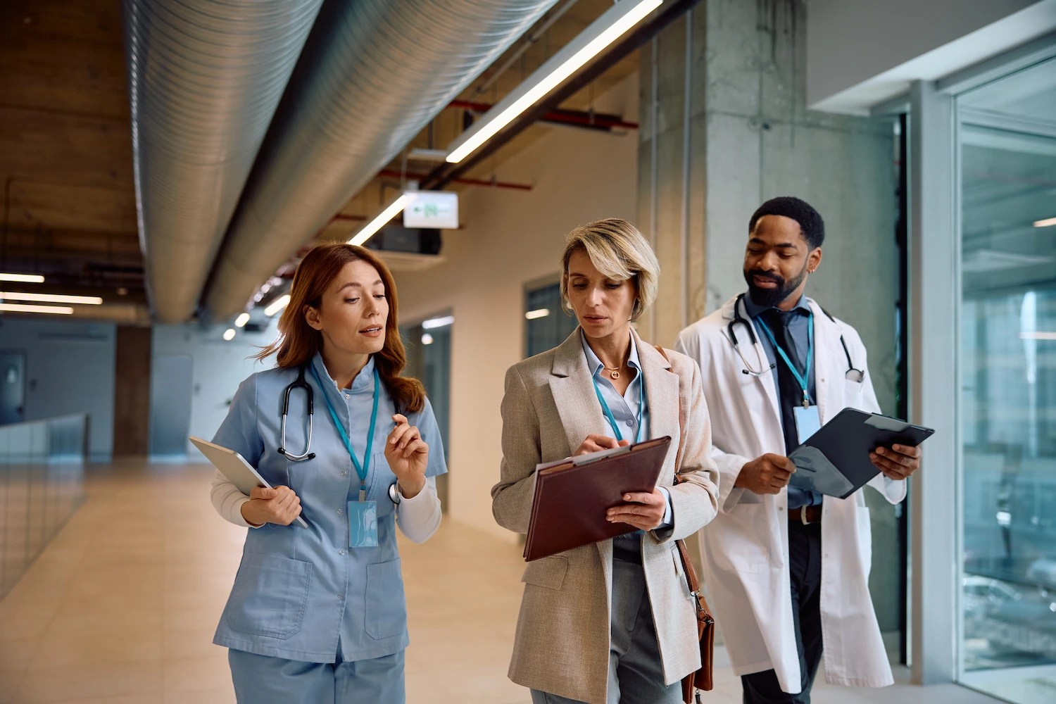 Facility administrator having a discussion about burnout with her staff.