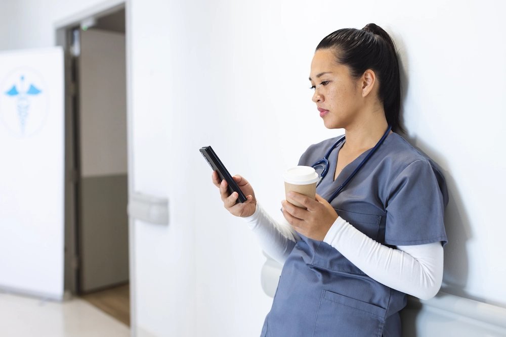 Clinician on break looking at her LinkedIn profile.